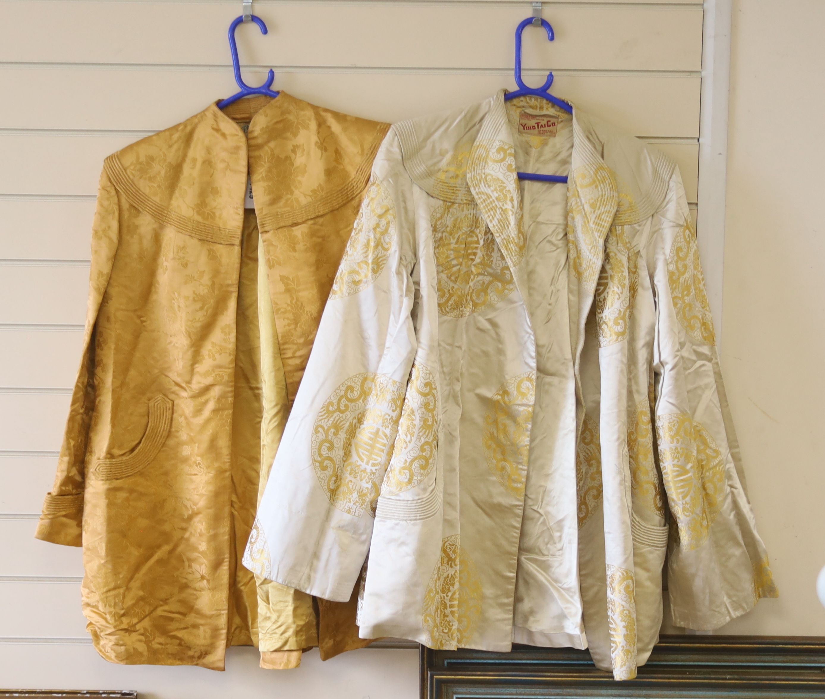 A 1940's Chinese yellow damask jacket, length 87cm, and a similar brocade jacket